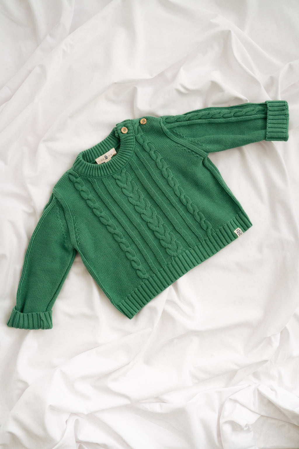 Baby und Kinder Kabelstrick Pullover aus 100% Bio-Baumwolle in grün Vorderansicht